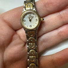 Gruen Swiss Women's watch. Small face with gold trim. GSL034, 269, 753