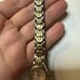 Gruen Swiss Women's watch. Small face with gold trim. GSL034, 269, 753
