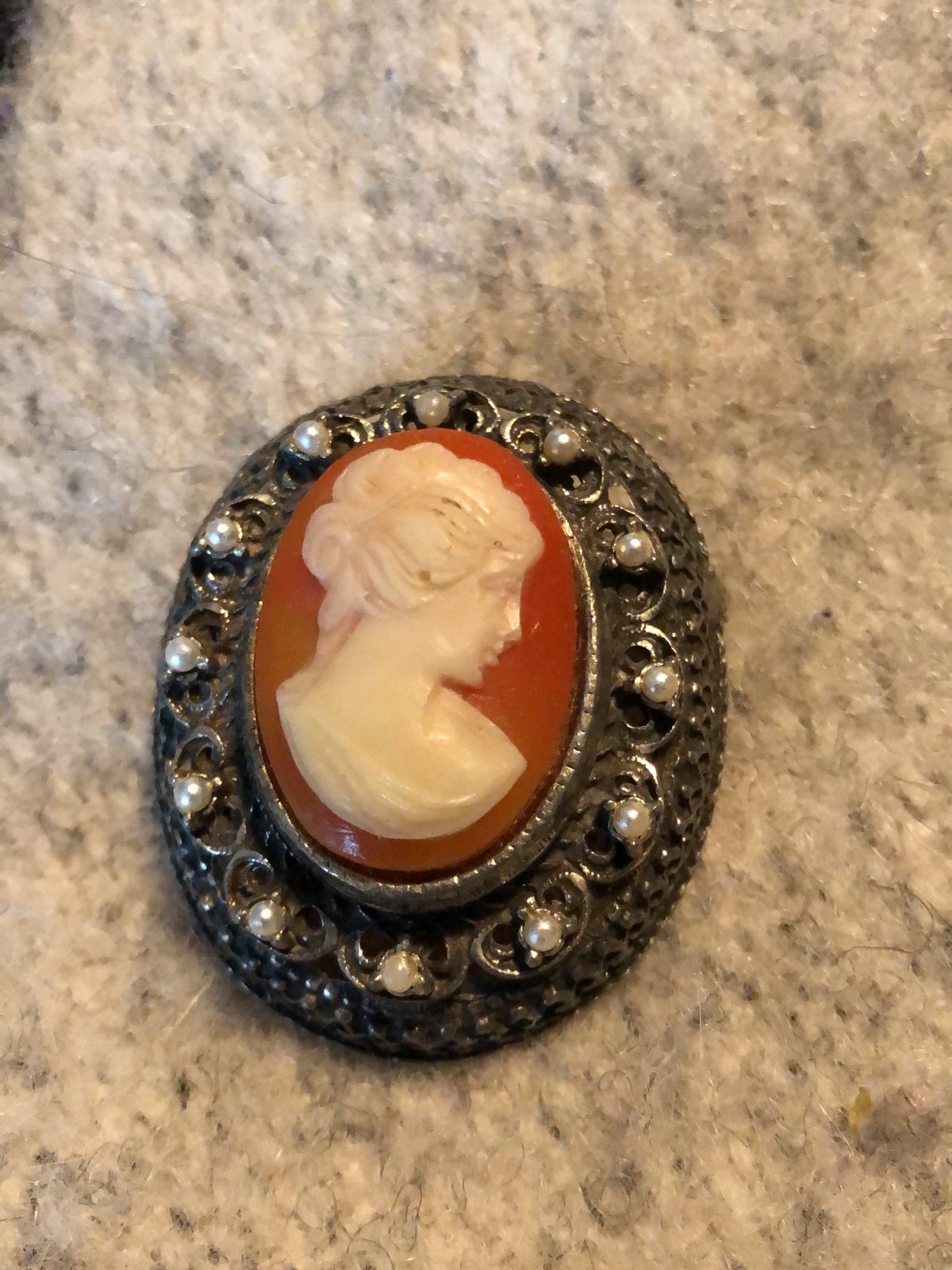 Large vintage cameo layered with tiny pearls