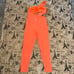 Free People Movement NWT! Orange Transcend Limits Onesie Size S
