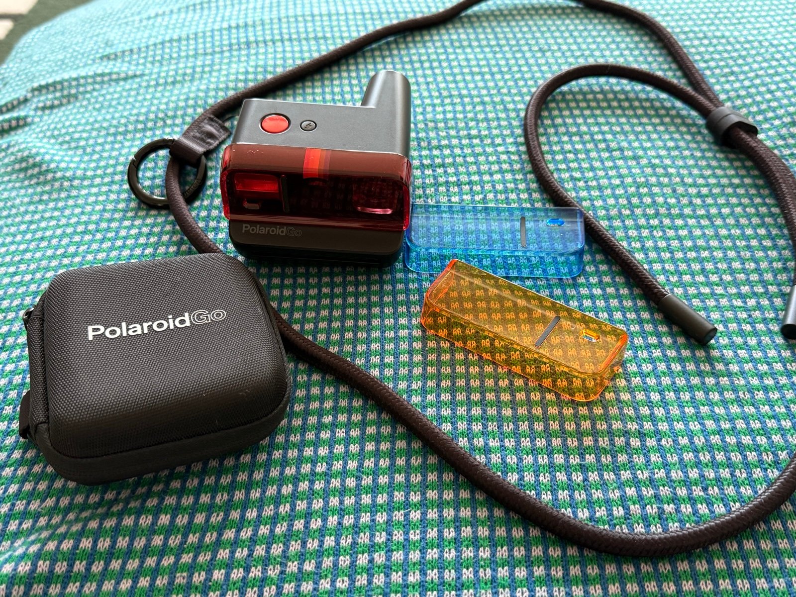 Polaroid Go, first gen with accessories.
