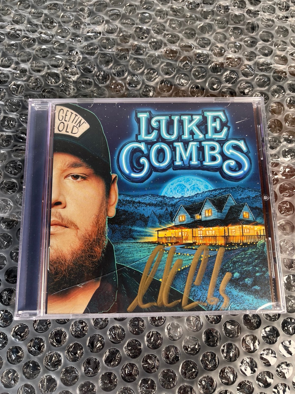 Luke Combs Signed CD Gettin Old BRAND NEW CRACKED