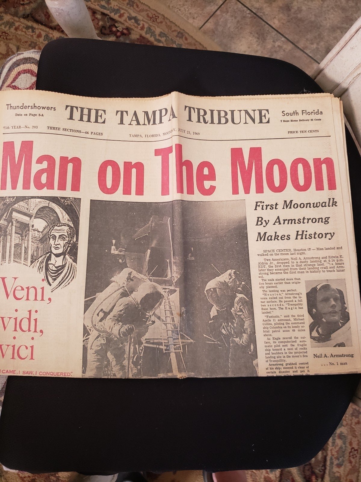 July 21, 1969 newspaper man lands on moon