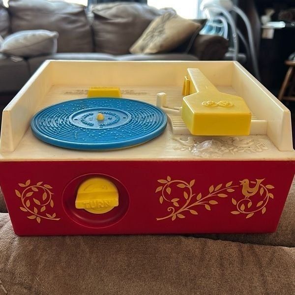 Vintage 1971 Fisher Price Music Record Player. Works! Comes with One Record.