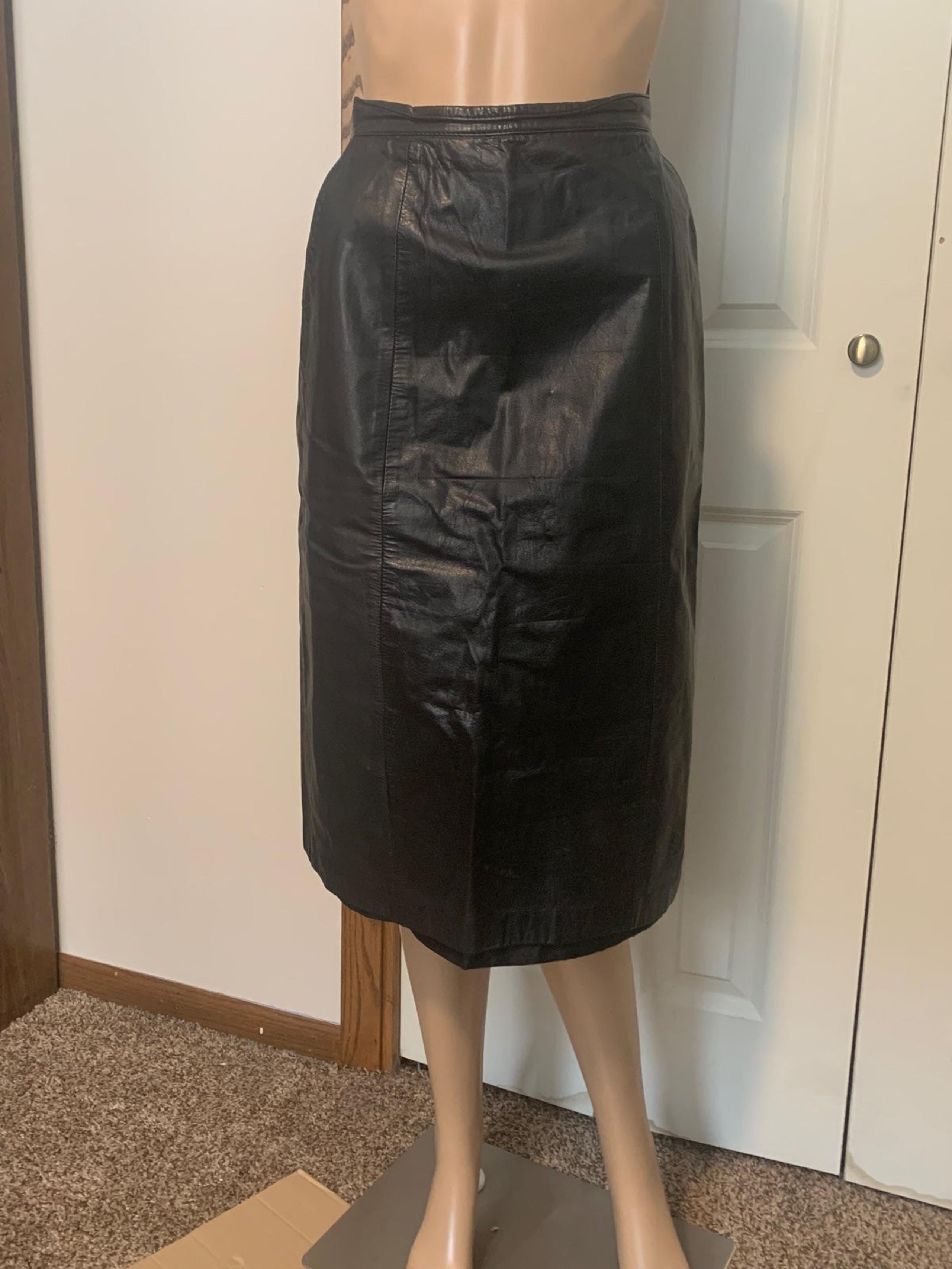 Vintage 80’s knee length black leather pencil skirt with pockets
