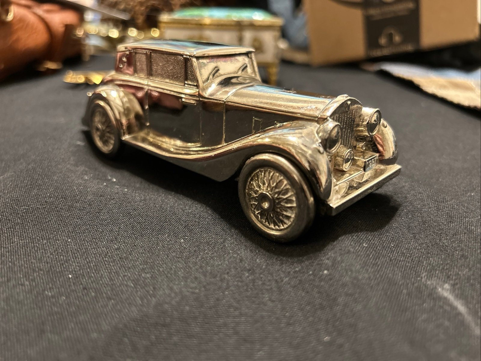 Silver plated Rolls-Royce coin bank