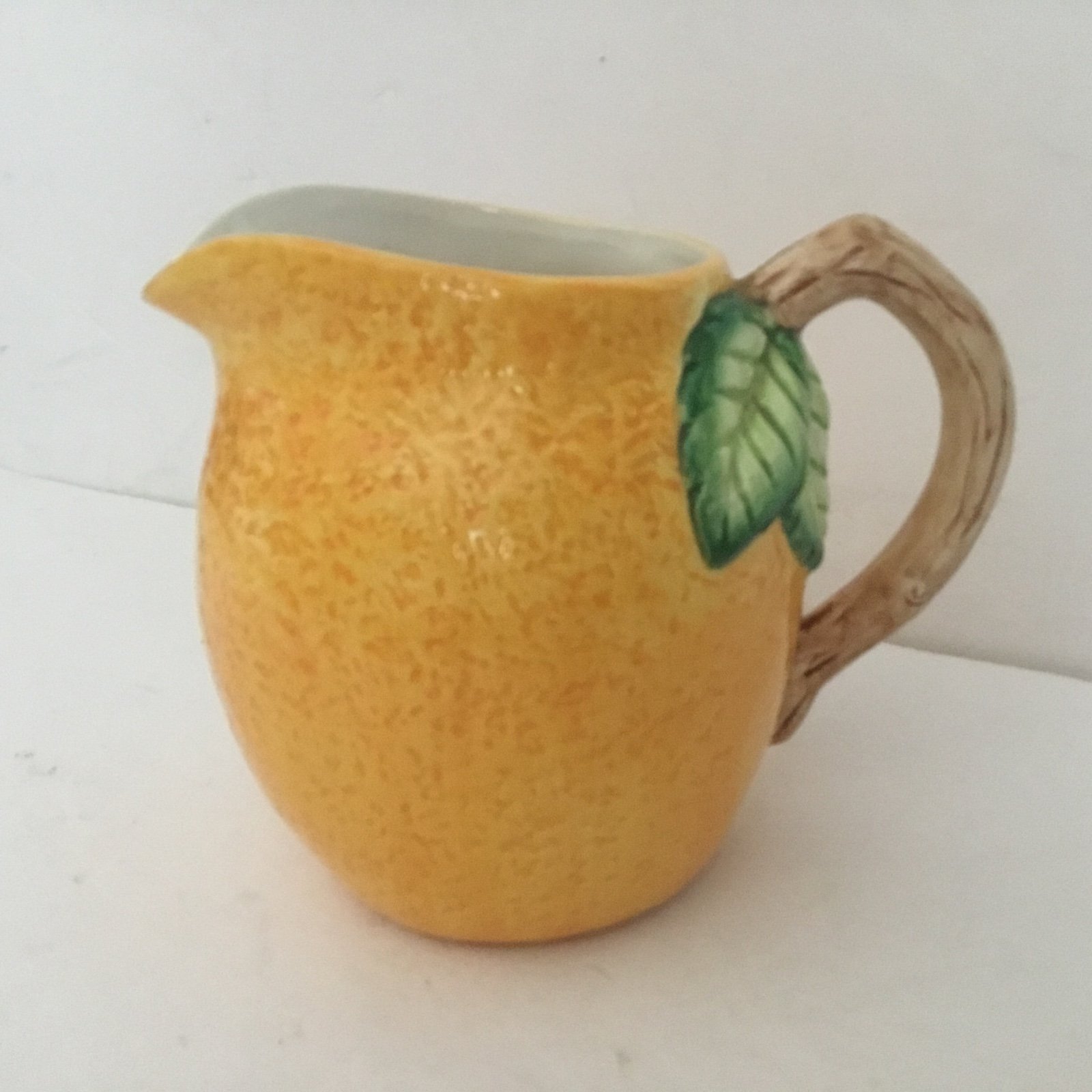 Vintage. Orange shaped textured pitcher. New