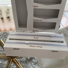 White ziplock bags storage organizer with foil and plastic wrap cutter