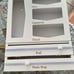 White ziplock bags storage organizer with foil and plastic wrap cutter