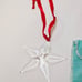 Tiffany and Co. crystal star pendant.