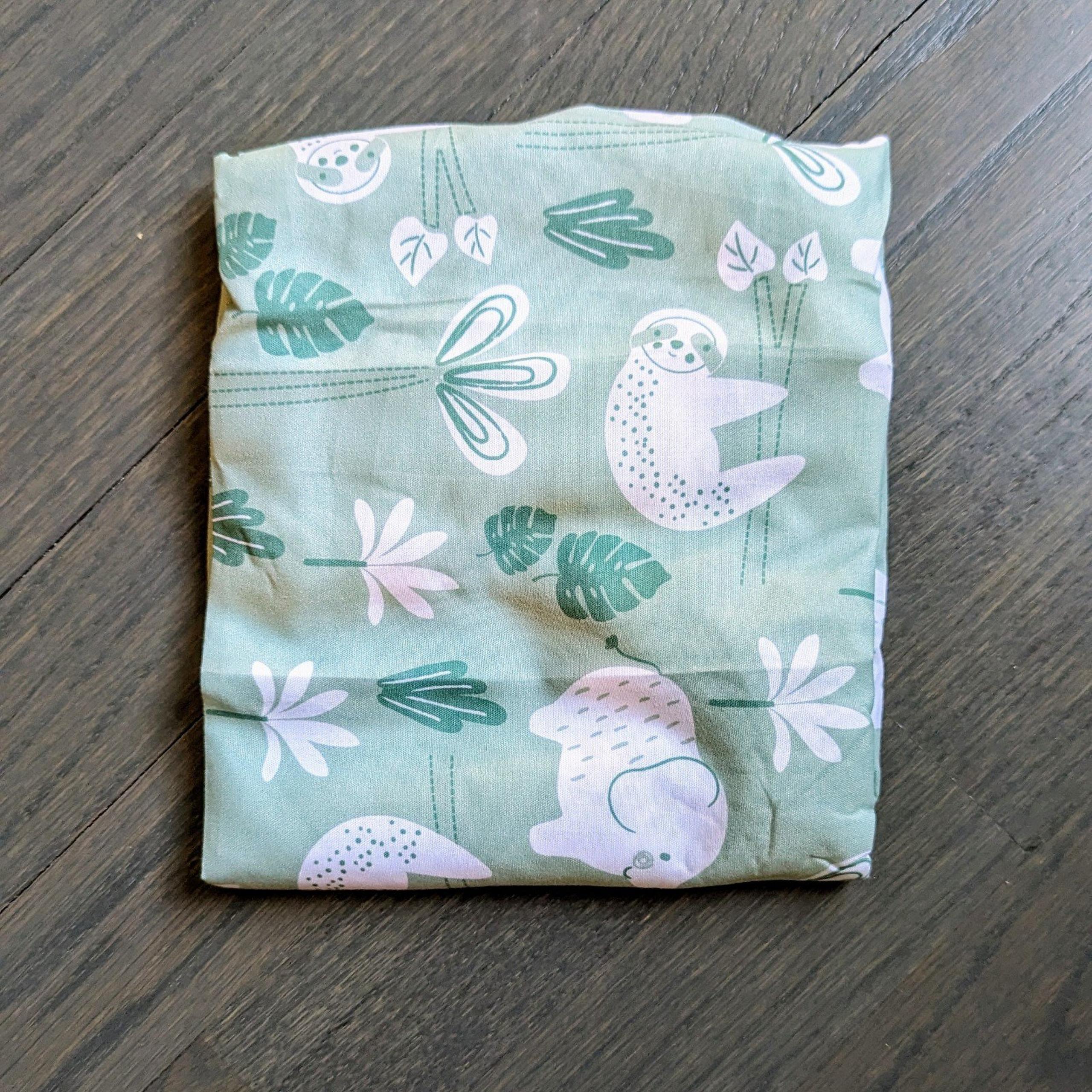 The Peanutshell Fitted Bassinet Sheet Set, Green Animals
