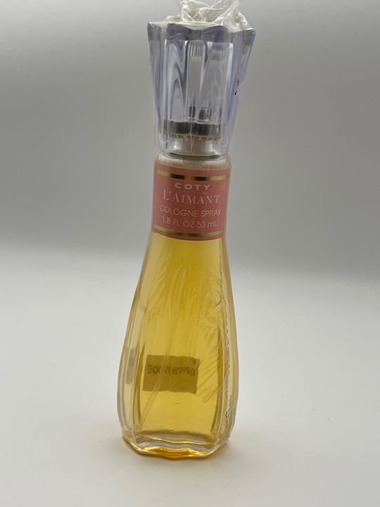 L'Aimant by Coty Cologne Spray (1.8 fl oz)