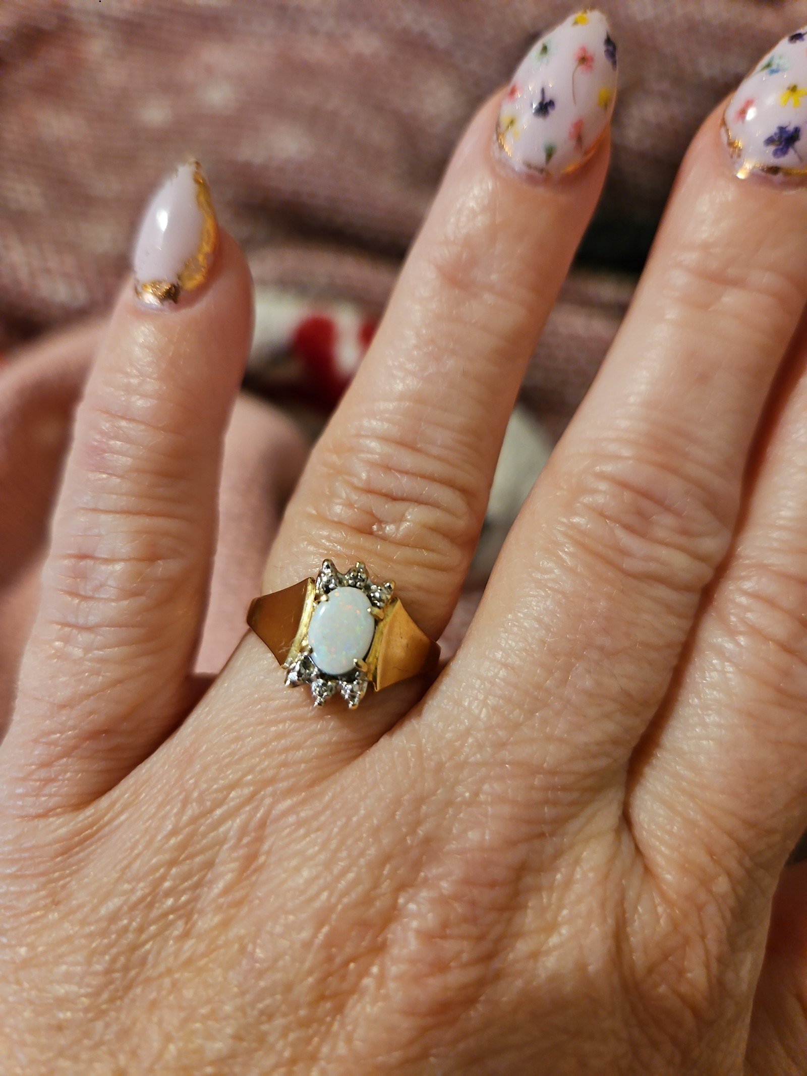 10k yellow gold ring with genuine white opal and diamond chips. Size 6