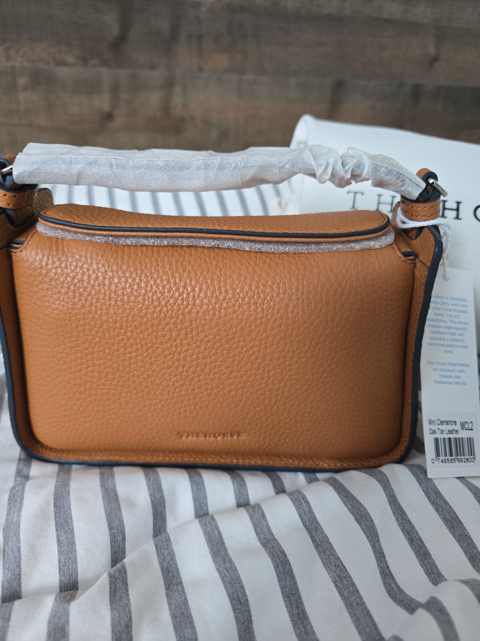 Brand New! The Horse Mini Clementine crossbody handbag! Tan color