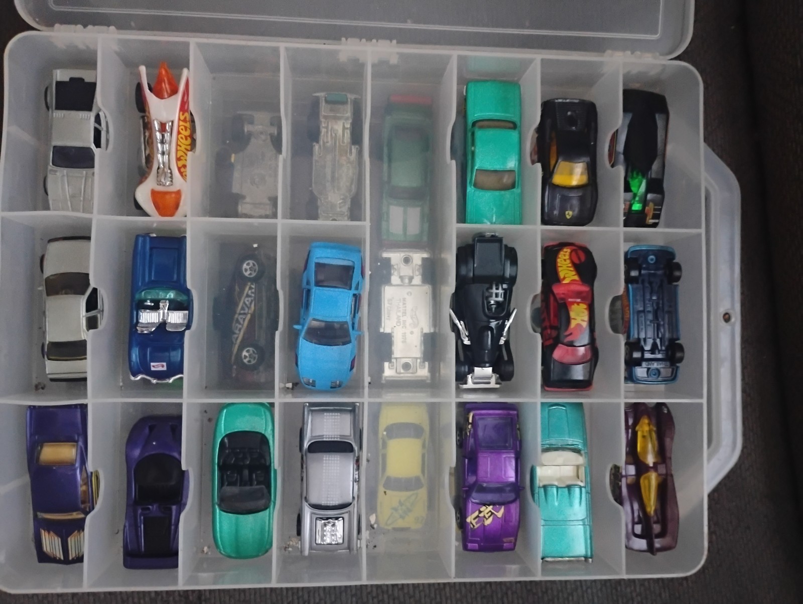 Lot of 41 hot wheels in plastic carry case