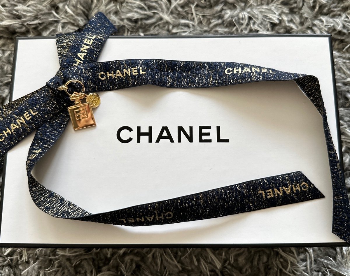 Chanel small box with ribbon and charm