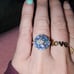 10k white gold ring with blue topaz and multi gems.