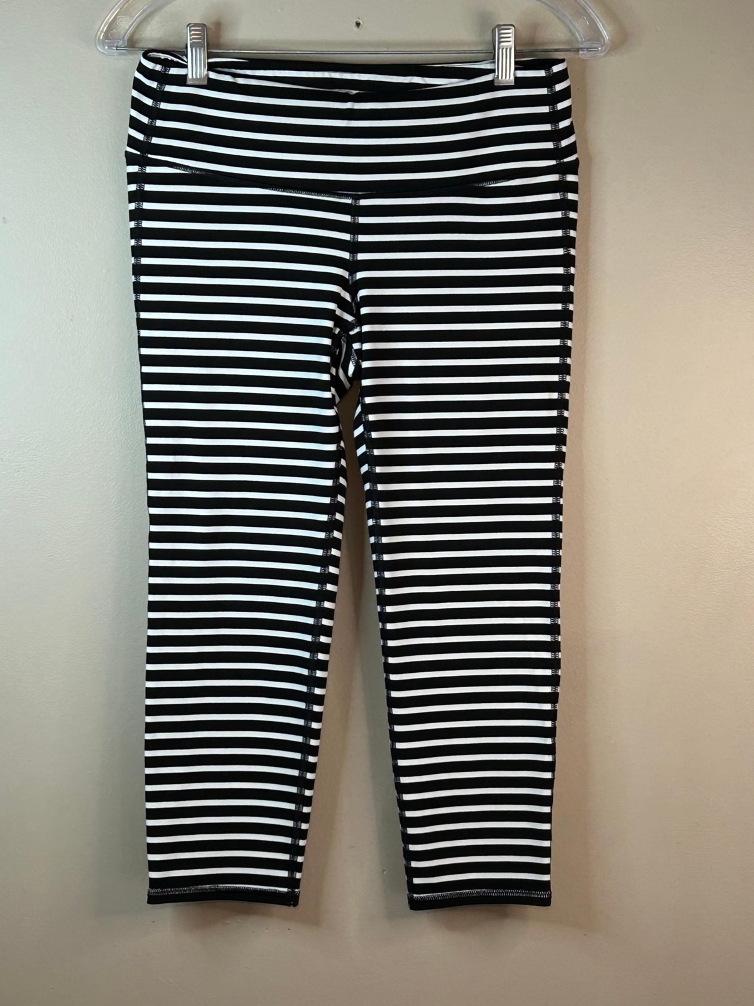 Athleta Woman's Navy and white striped cropped Athletic Leggings Size Medium