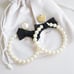 For Love & Lemons Bowtie Pearl Hoop Earrings