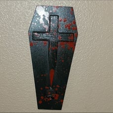 Coffin shaped bottle opener