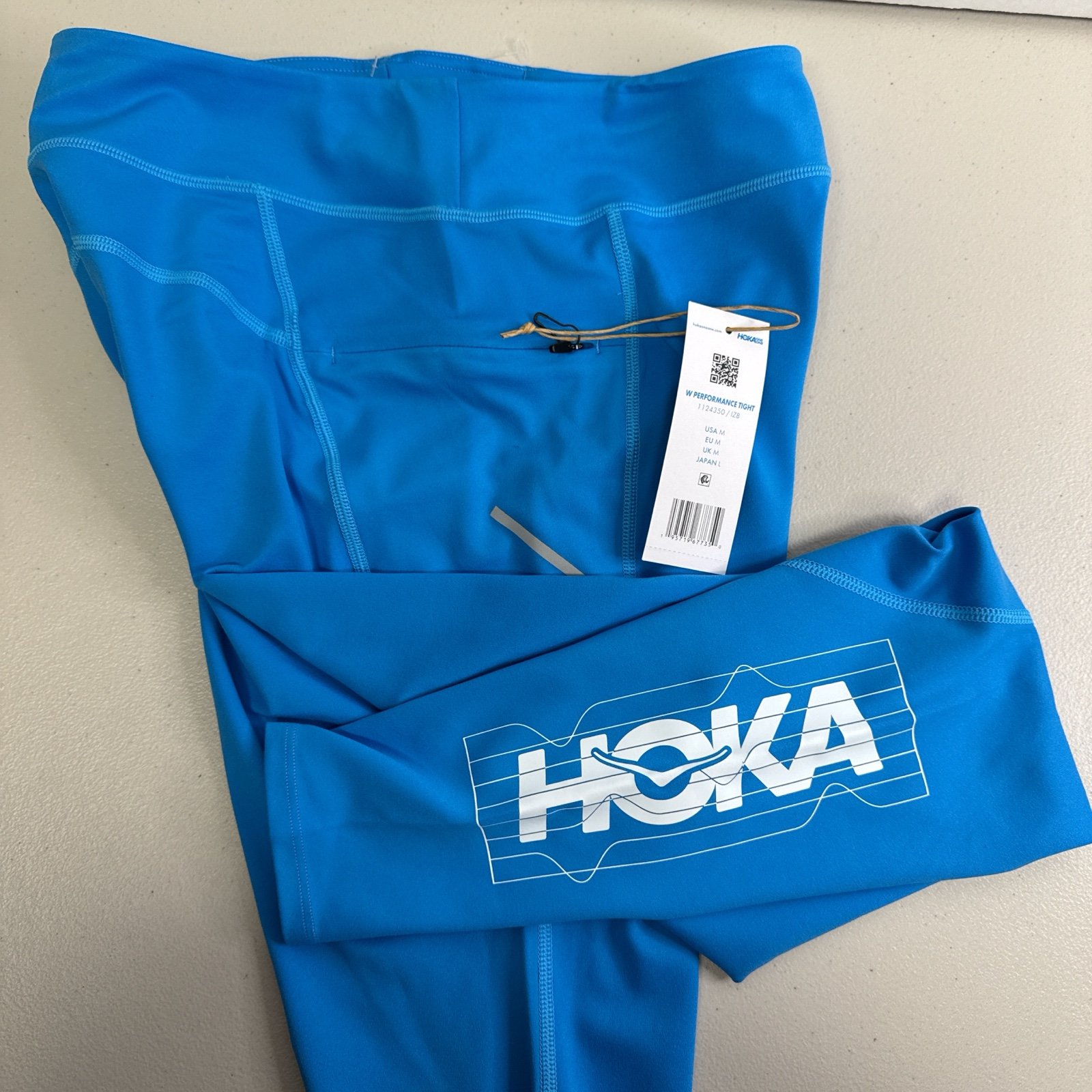 Hoka One One Womens Performance Tight Leggings Pants Size M Blue NWT Zip Pockets