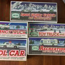 Hess lot of 5 NIB Trucks Patrol Car RV sport utility