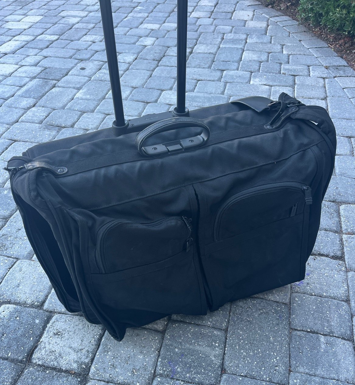 TUMI extended travel wheeled garment luggage black