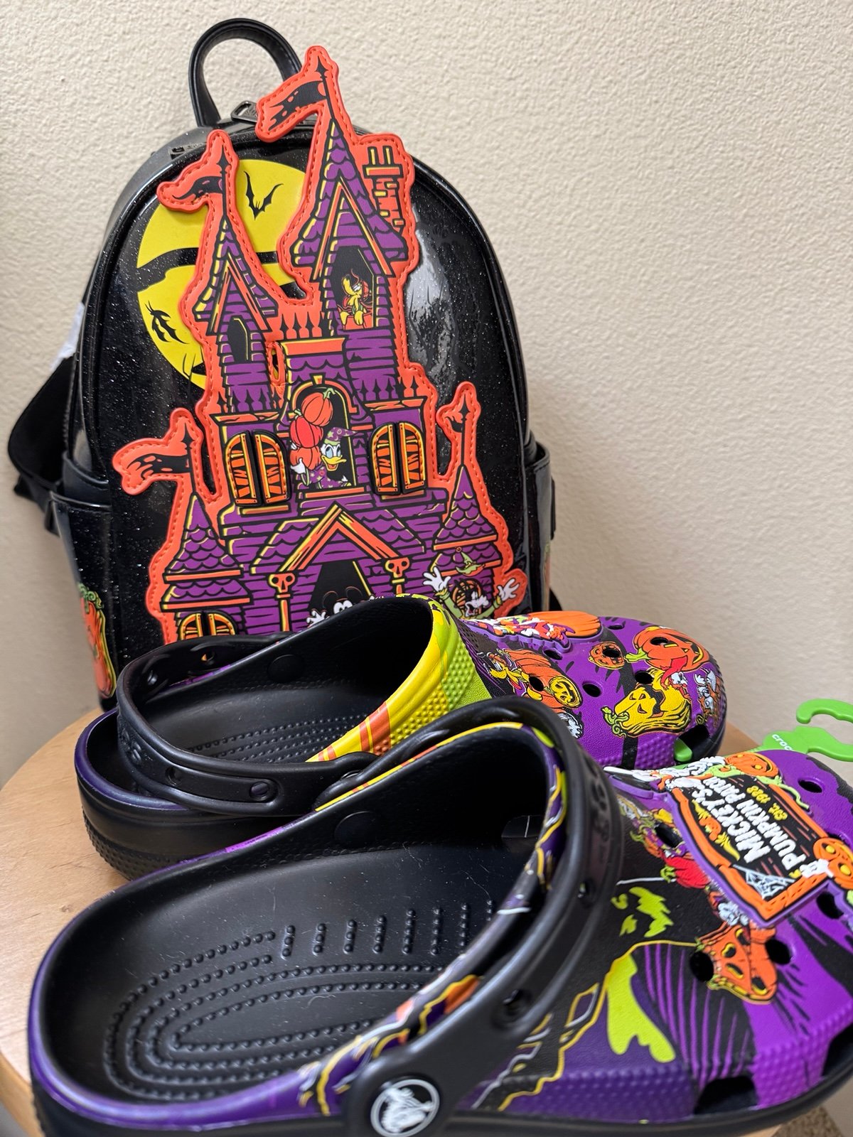 DISNEY PARK HALLOWEEN LOUNGEFLY AND HALLOWEEN CROCS (W SIZE 7/M SIZE 5)