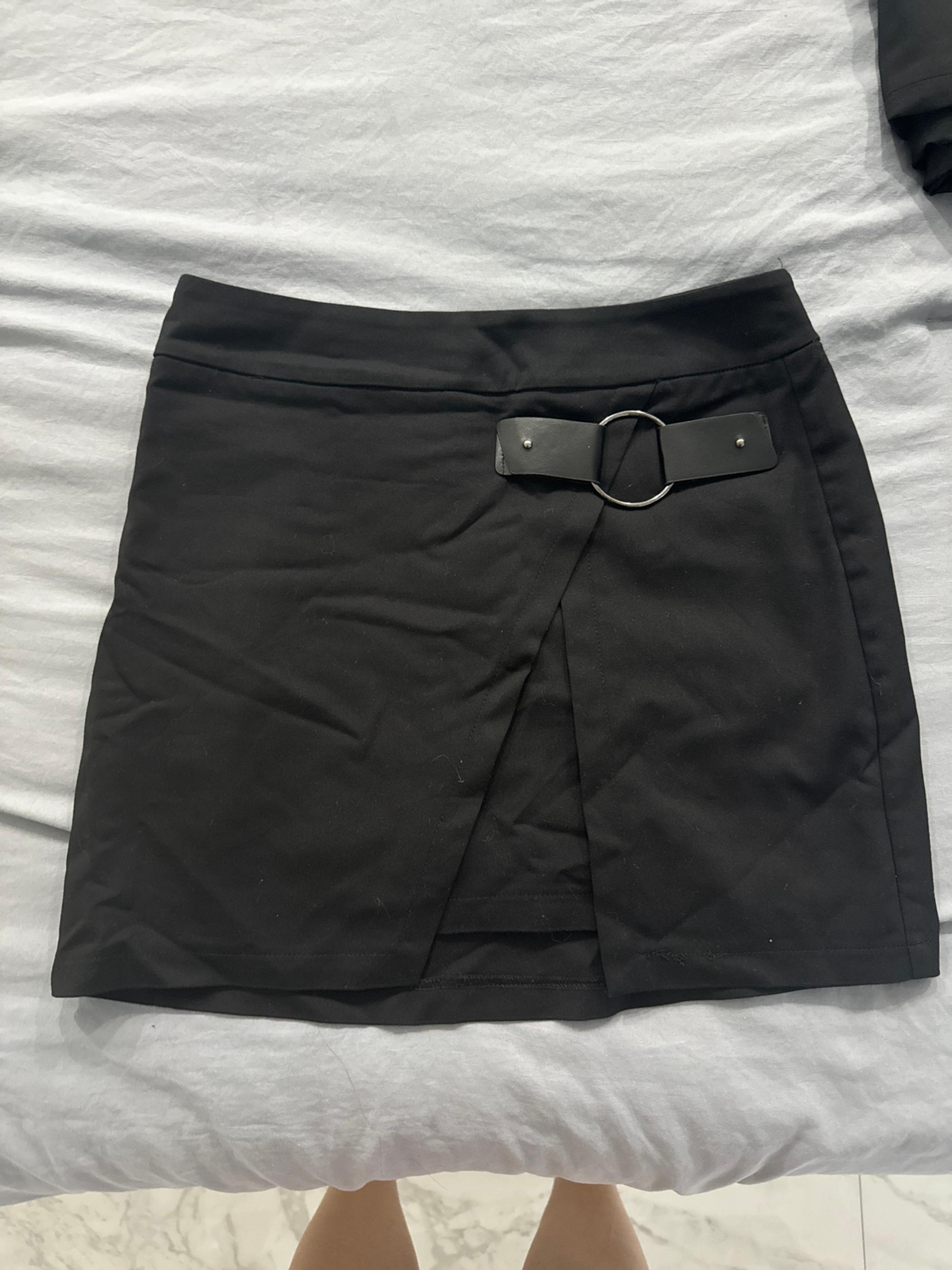 NWOT never worn LF Boutique black skirt