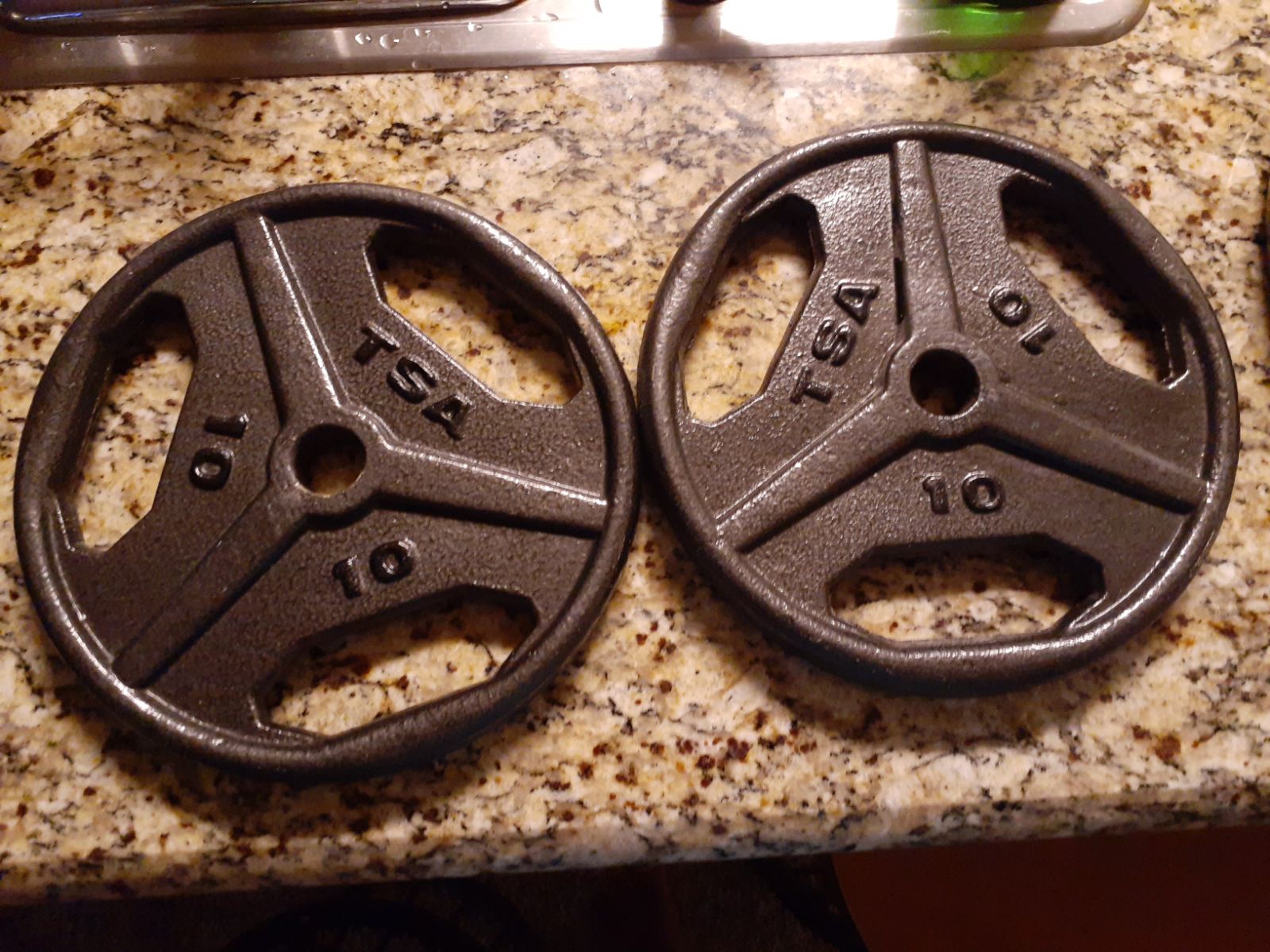 A Set of TSA 10lbs Barbell Plates
