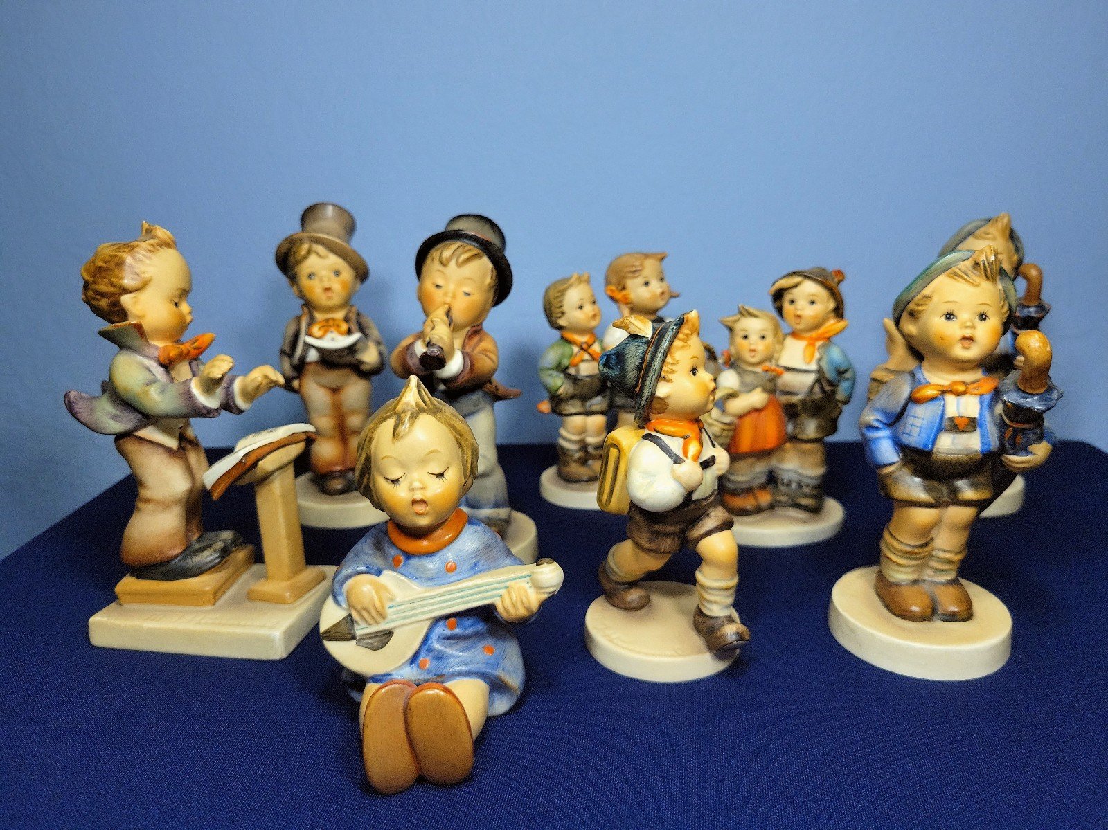 9 Assorted Hummel figurines