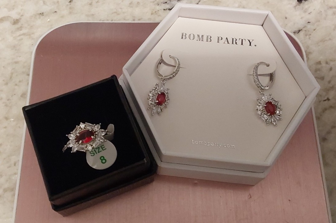 Bomb Party earrings and necklace