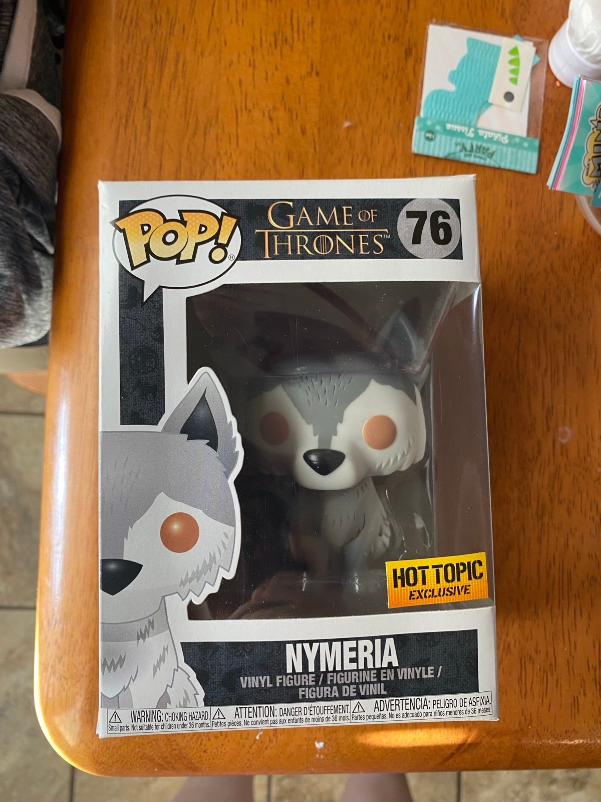 Nymeria hot topic exclusive game of thrones Funko Pop with xl shirt - detail