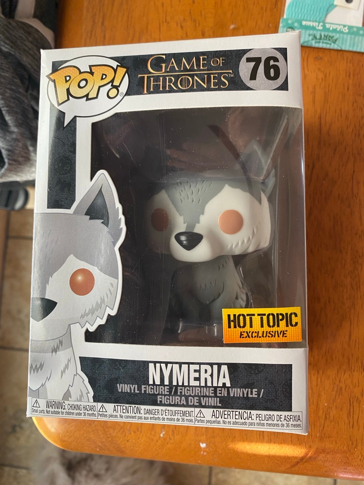 Nymeria hot topic exclusive game of thrones Funko Pop with xl shirt - detail
