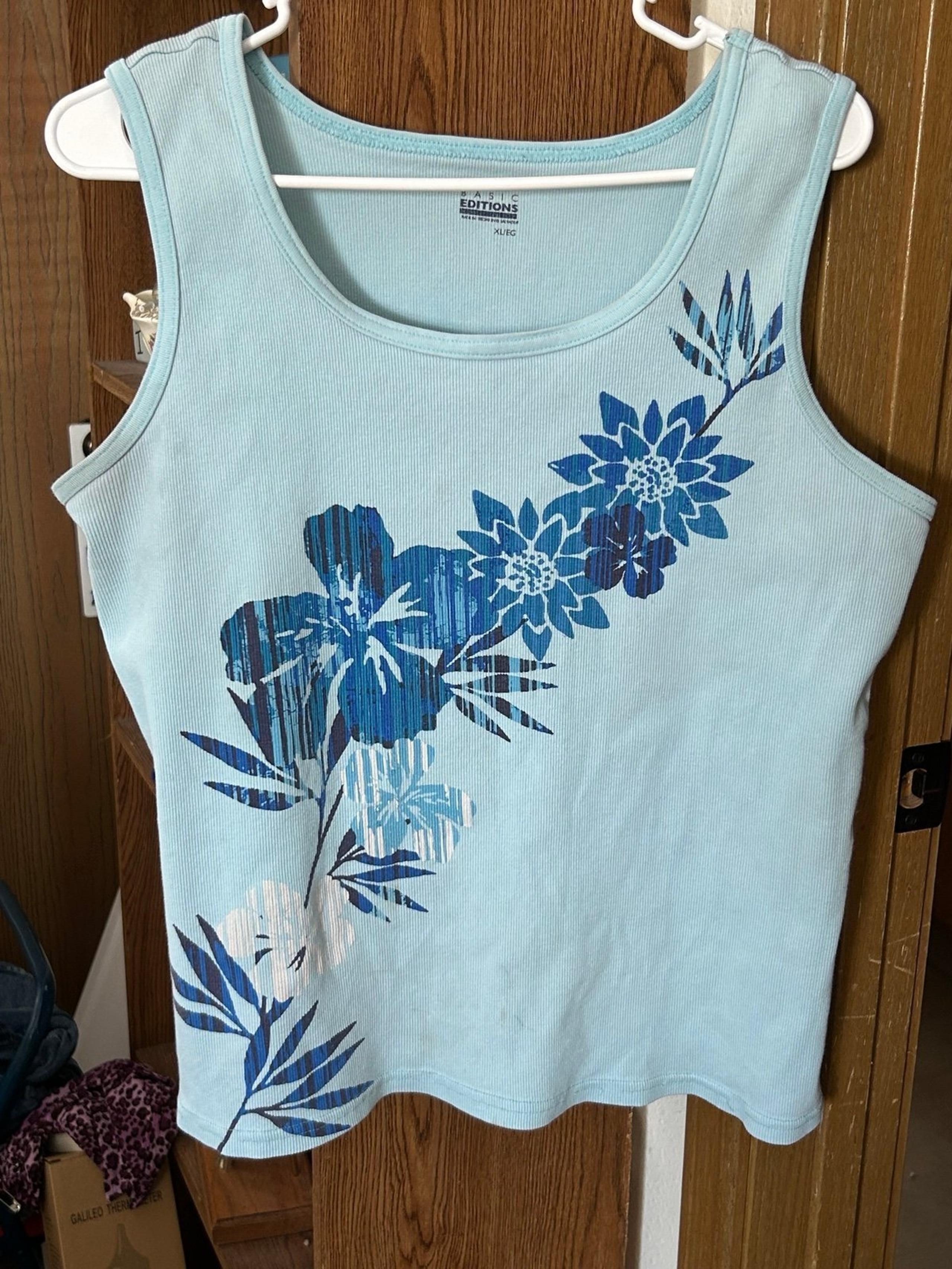 Women’s Basic Editions tank top. Light blue with floral design