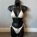 Triangl tie dye String style swimsuit set.