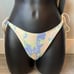 Triangl tie dye String style swimsuit set.