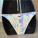 Triangl tie dye String style swimsuit set.