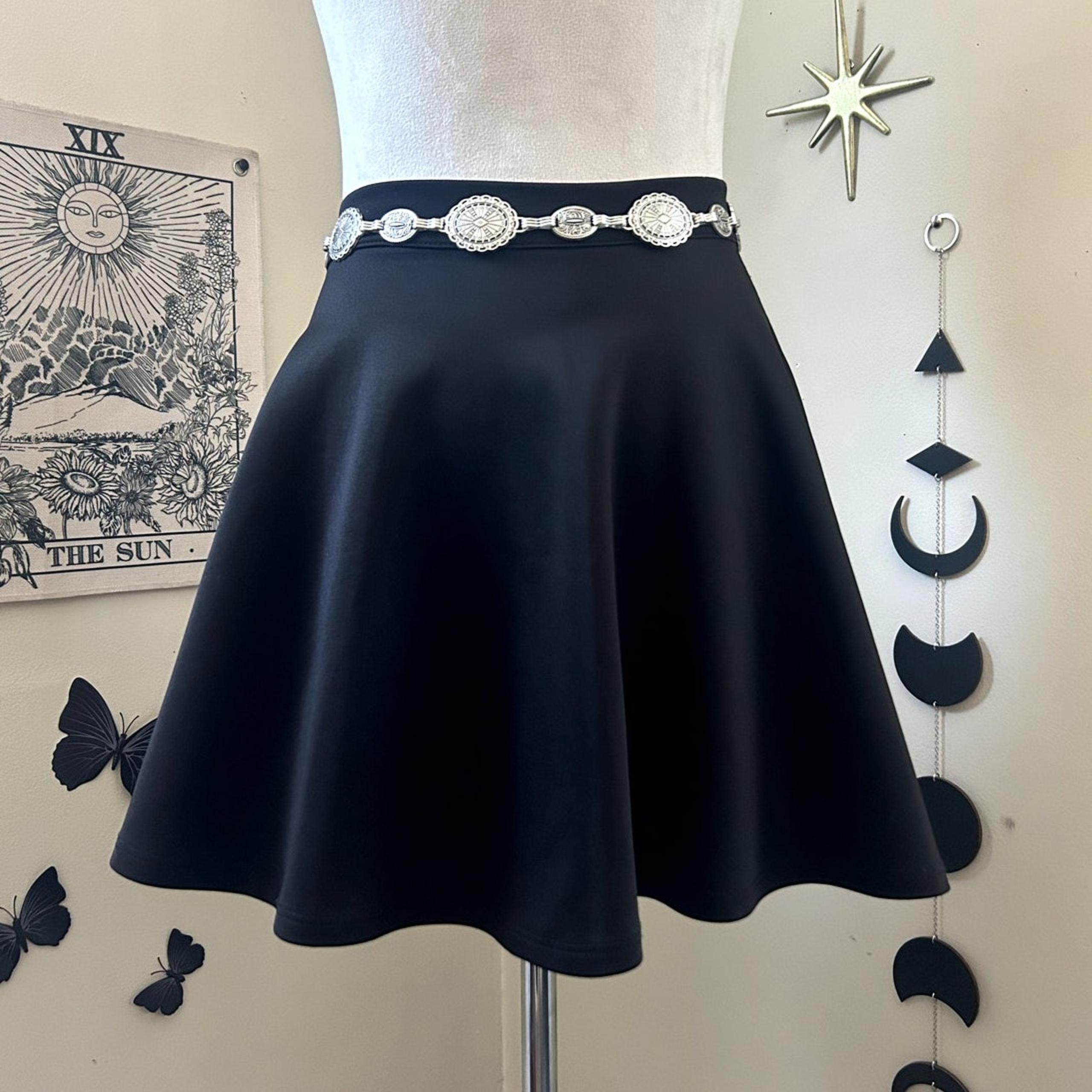 Francesca’s Collection Bird Cage Label Mini Skirt