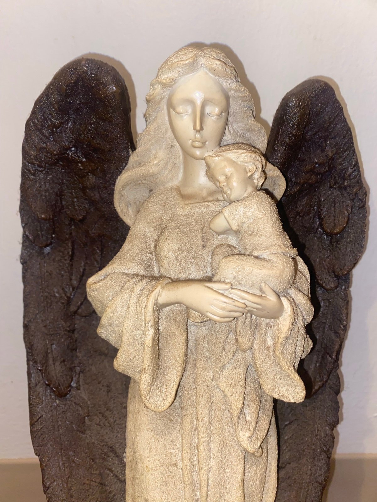 Mother Angel Cradling her Baby