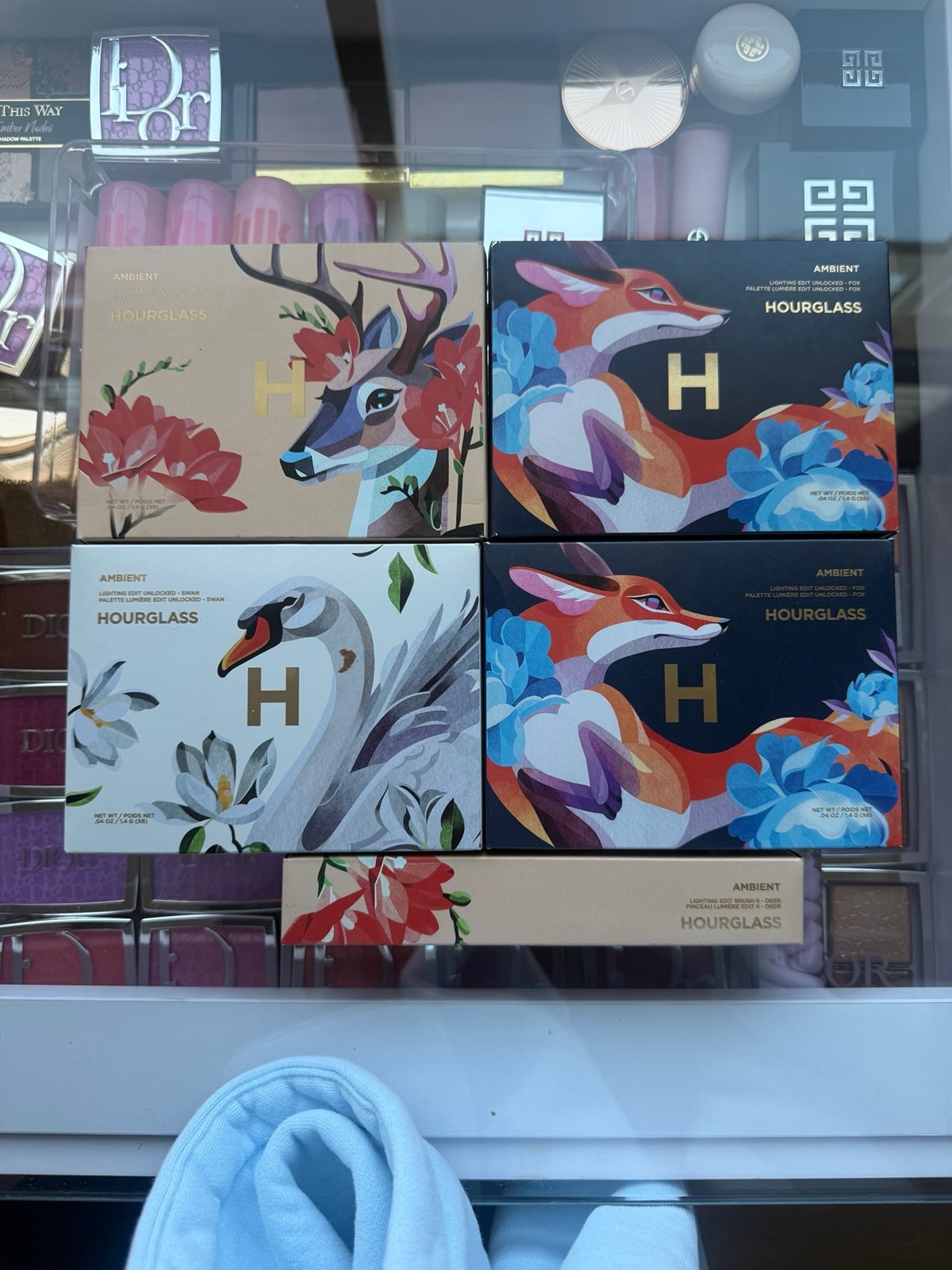 four hourglass palettes plus brush