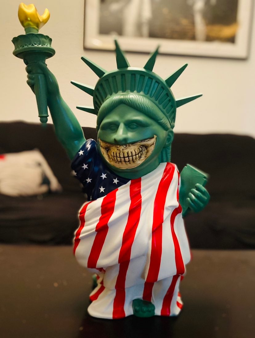 Ron English signed vinyl figure