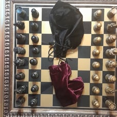 Handcrafted chessboard with vintage pieces
