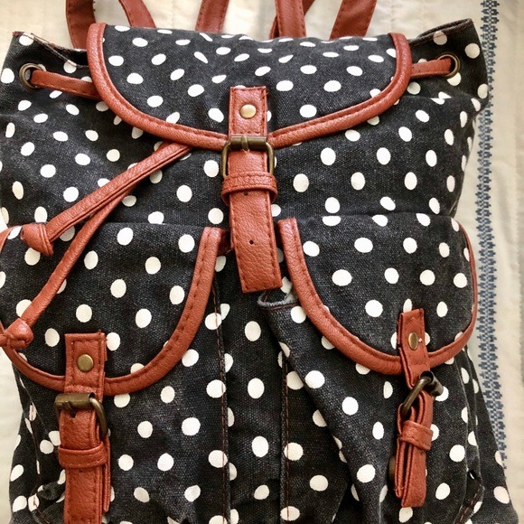 Canvas leather trimmed backpack bag