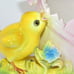 VINTAGE NORCREST PINK HATCHED EGG W/ A BOW, REVEALING A YELLOW CHICKADEE