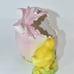 VINTAGE NORCREST PINK HATCHED EGG W/ A BOW, REVEALING A YELLOW CHICKADEE
