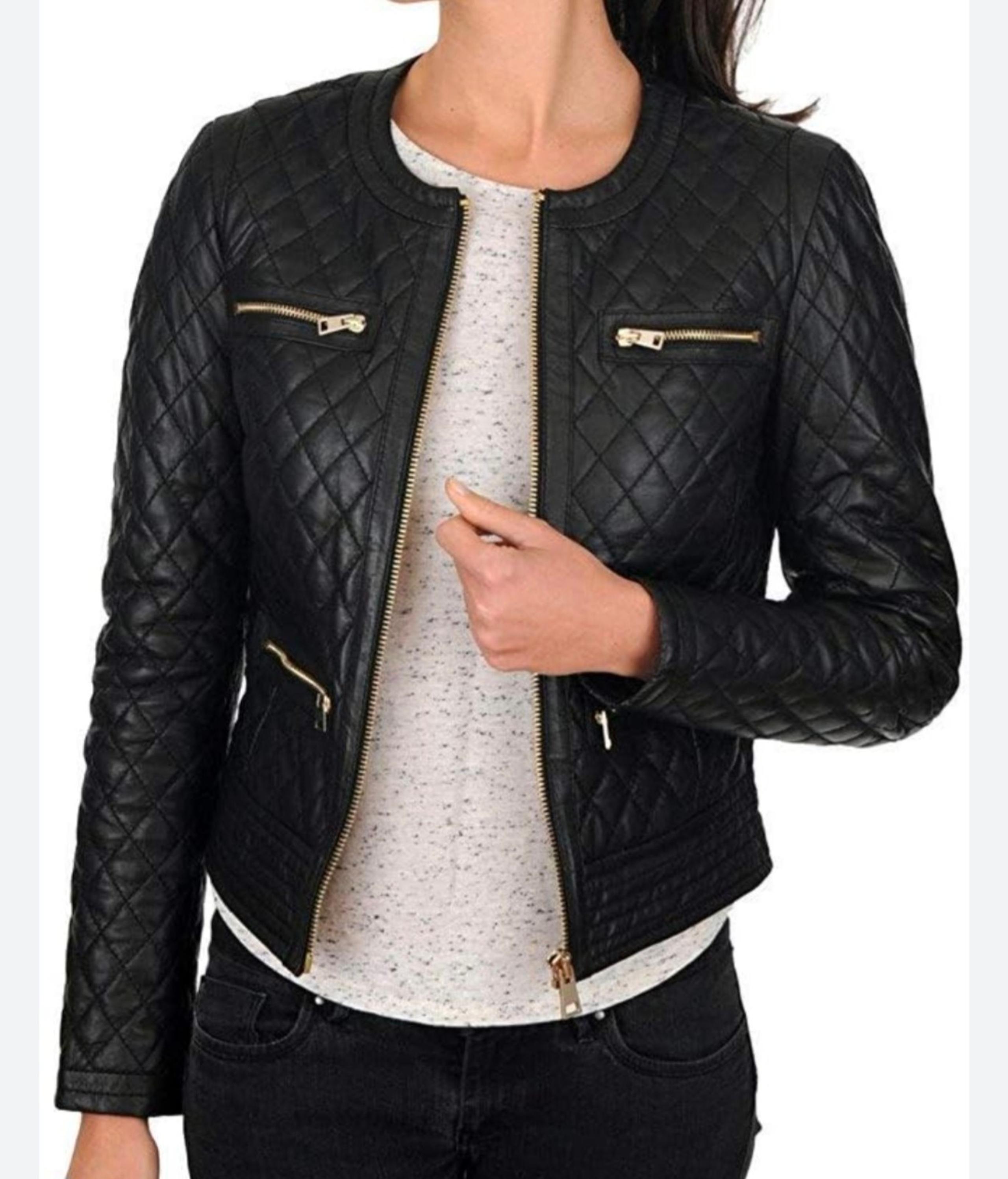Women's size small faux leather quilted moto jacket with gold stud details
