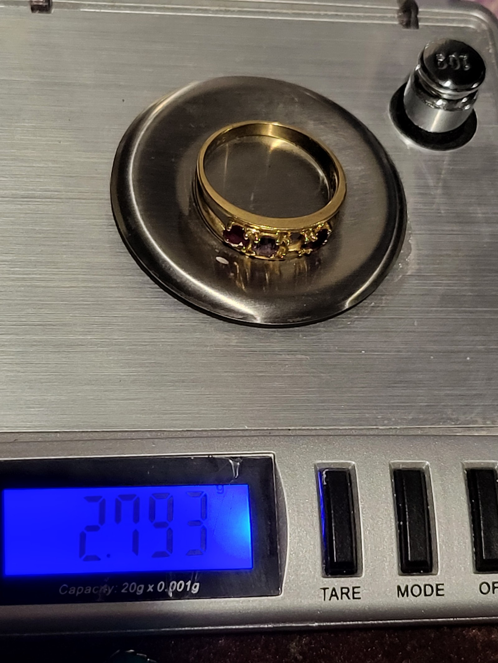 14k solid gold 4 stone ring. (1 stone missing)