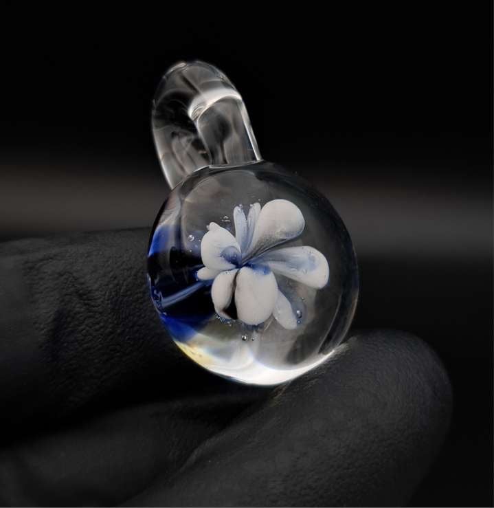 Hand Blown Glass Pendant with Blue and White Flower Uv reactive