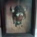 Native American Sculpture on fur in shadow box